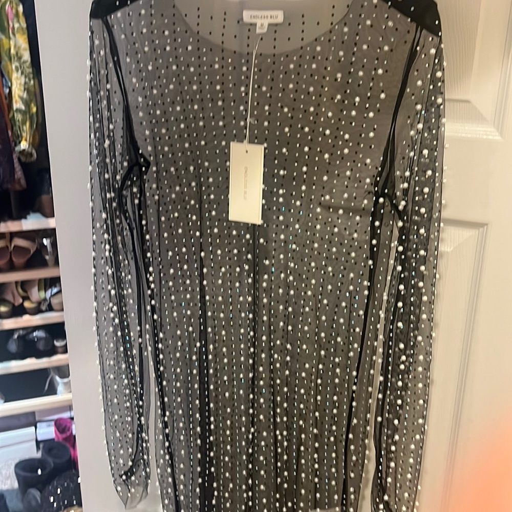 Sheer cover up in diamonds and pearls. Size medium.